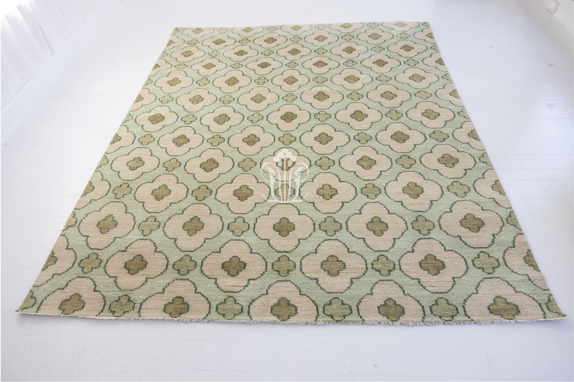 Patterned rug with floral design on a white background