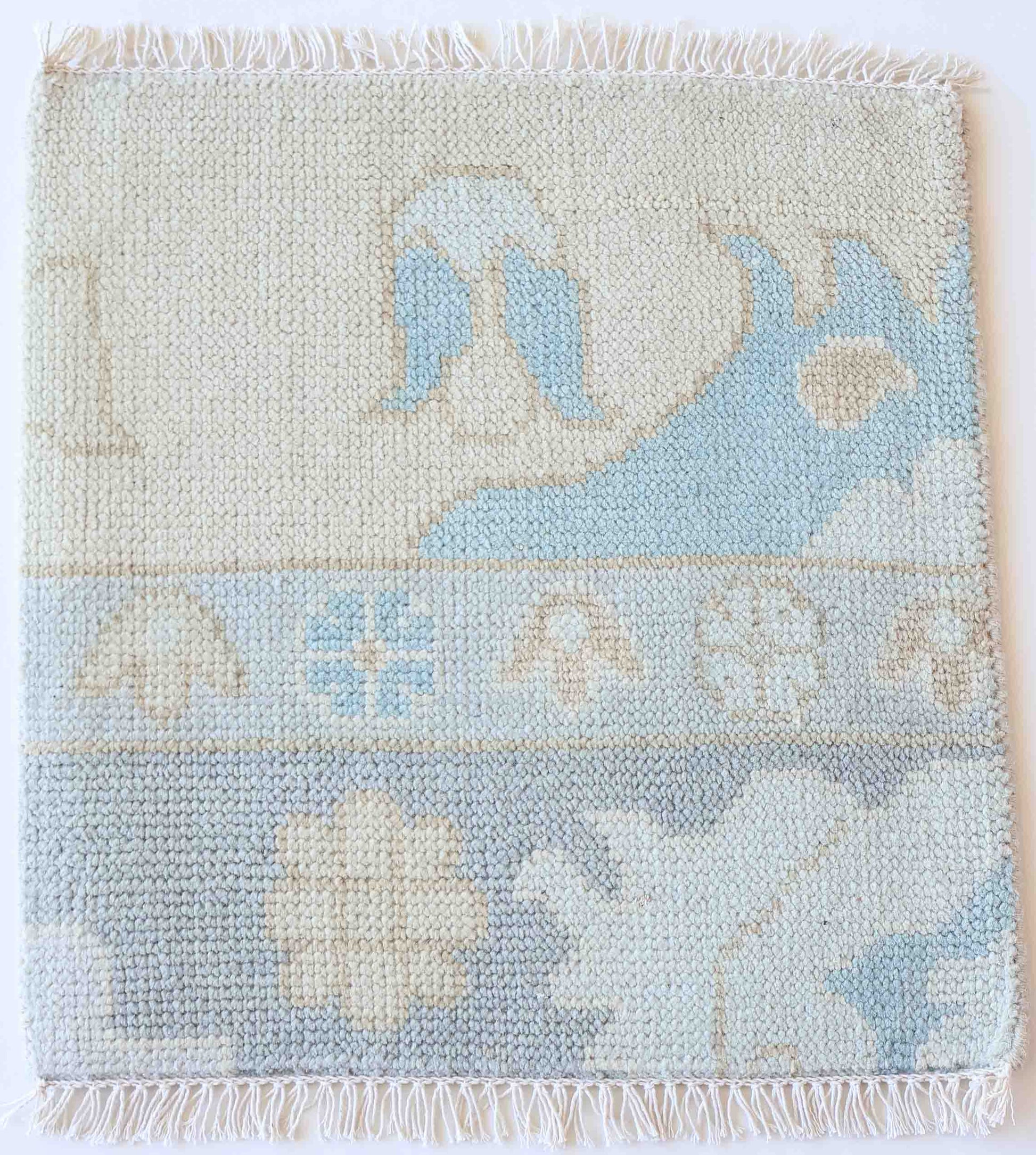 Handknotted wool rug sample in soft blue and ivory with traditional floral pattern – Lottie Rug Sample by Locust Lane Rugs