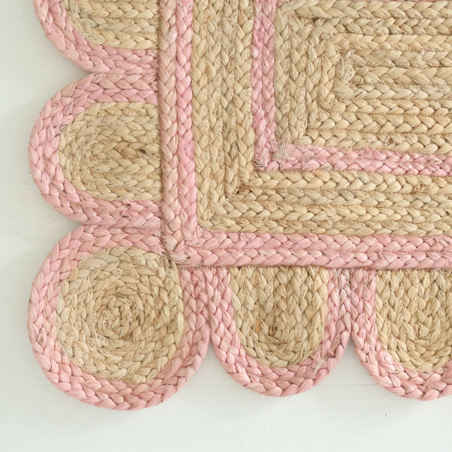 Hand-braided natural jute rug with scalloped light pink border and rectangular woven center – Light Pink Scalloped Jute Rug by Locust Lane Rugs