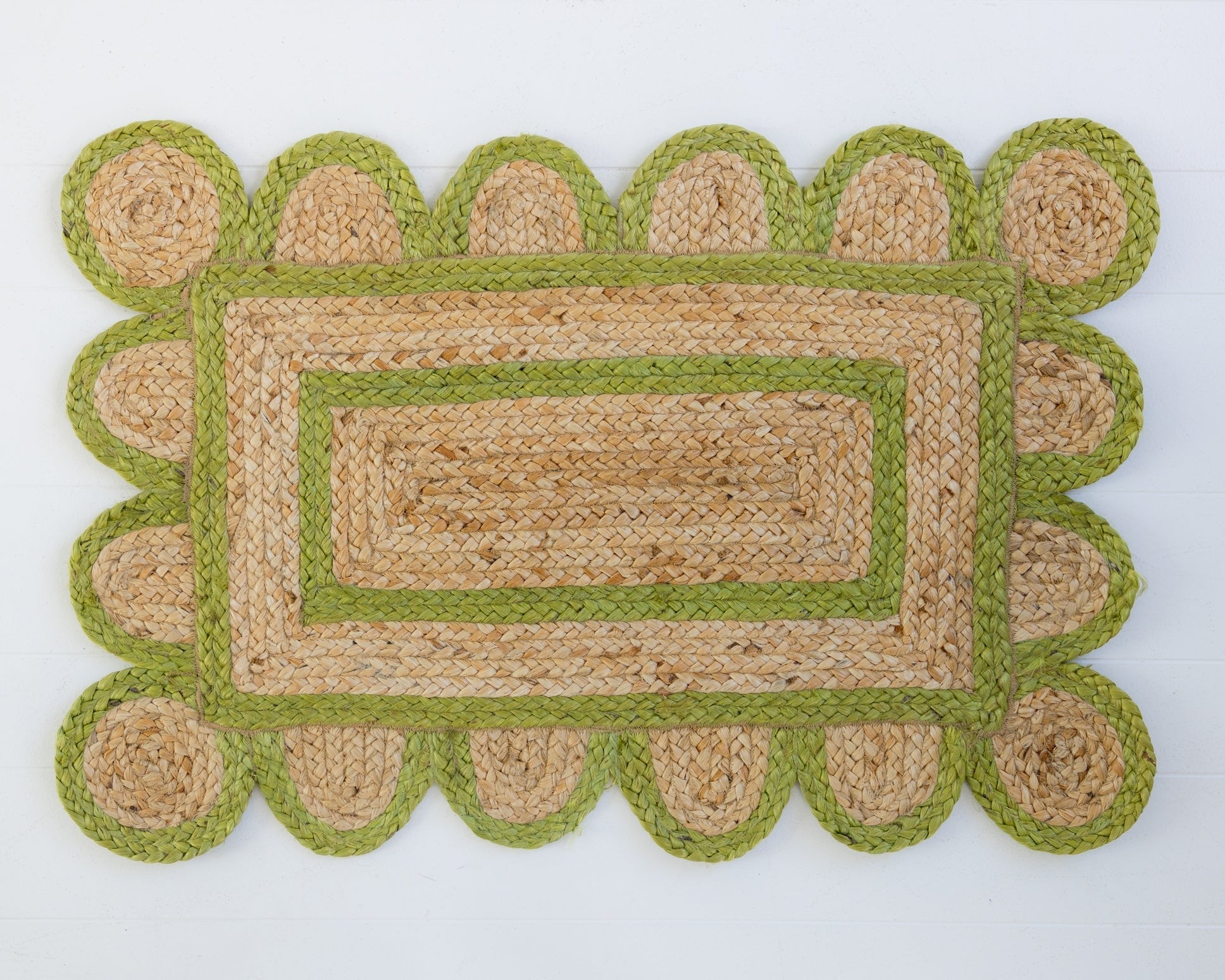 Hand-braided natural jute rug with scalloped grass green border and rectangular center – Grass Green Scalloped Jute Mini Rug by Locust Lane Rugs