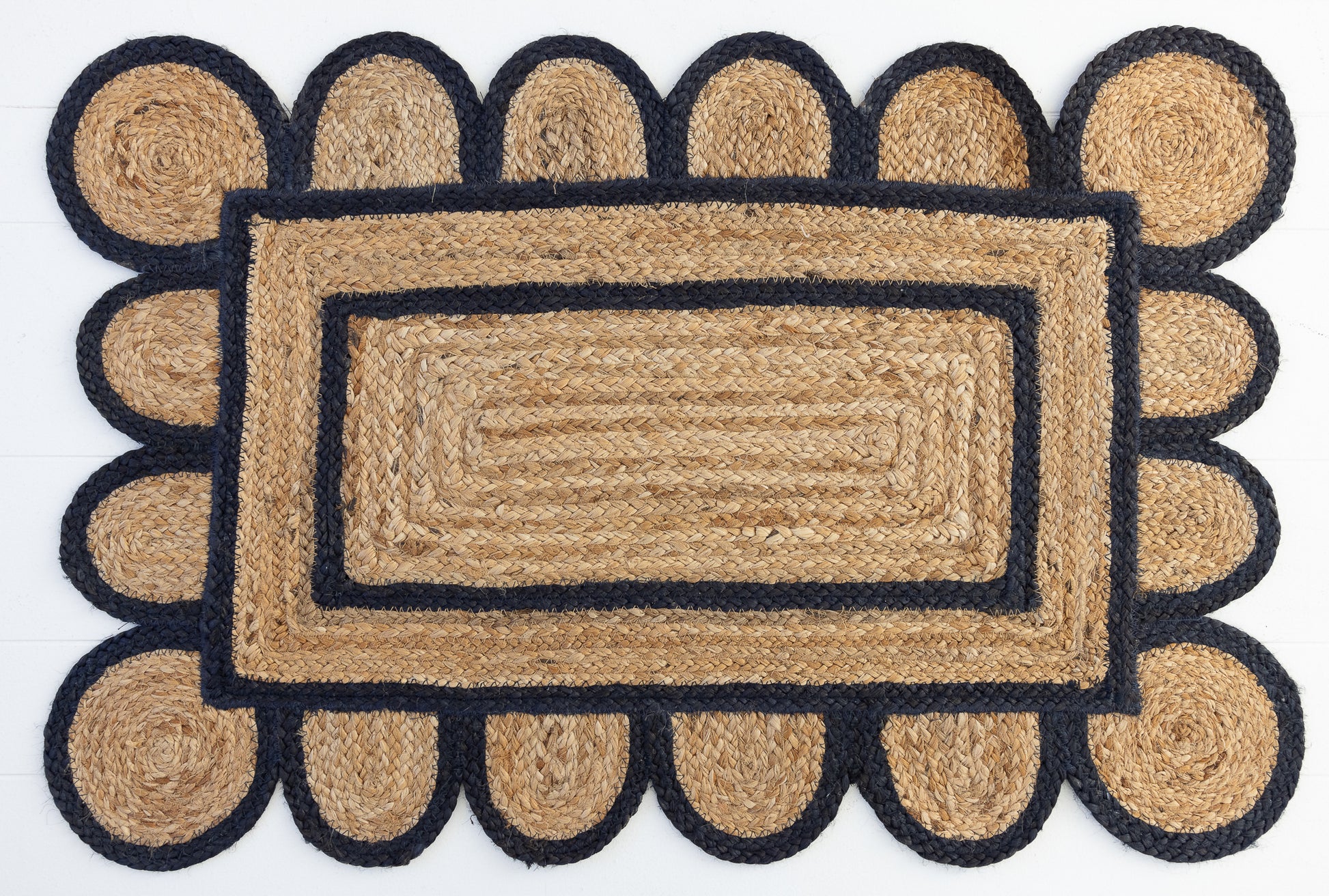 Hand-braided natural jute rug with navy scalloped border and rectangular center – Navy Scalloped Jute Mini Rug by Locust Lane Rugs