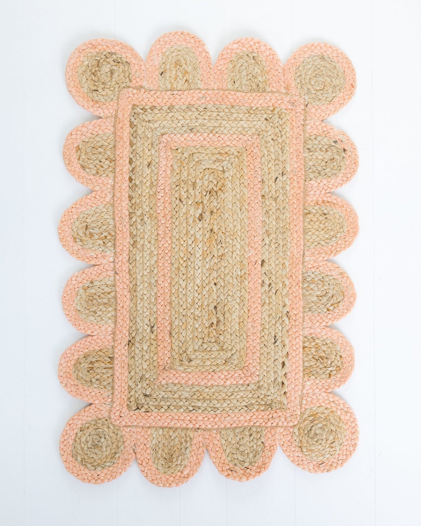 Hand-braided natural jute rug with scalloped border in soft peach – Peach Scalloped Jute Mini Rug by Locust Lane Rugs