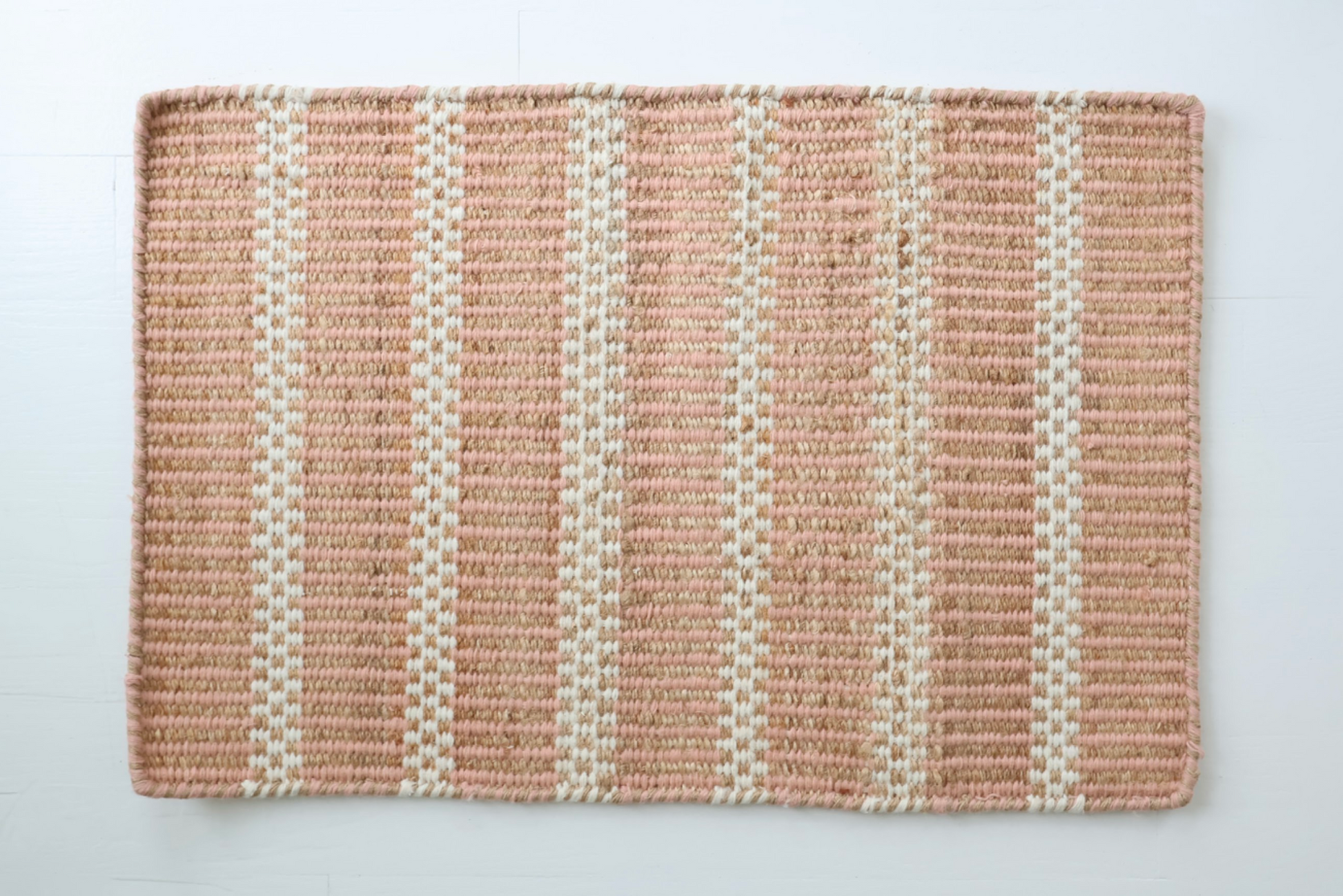 Shop the Sea Blue Jute & Wool Mini Rug, a handwoven accent rug featuring soft sea blue stripes, natural texture, and durable flatweave construction for everyday living.