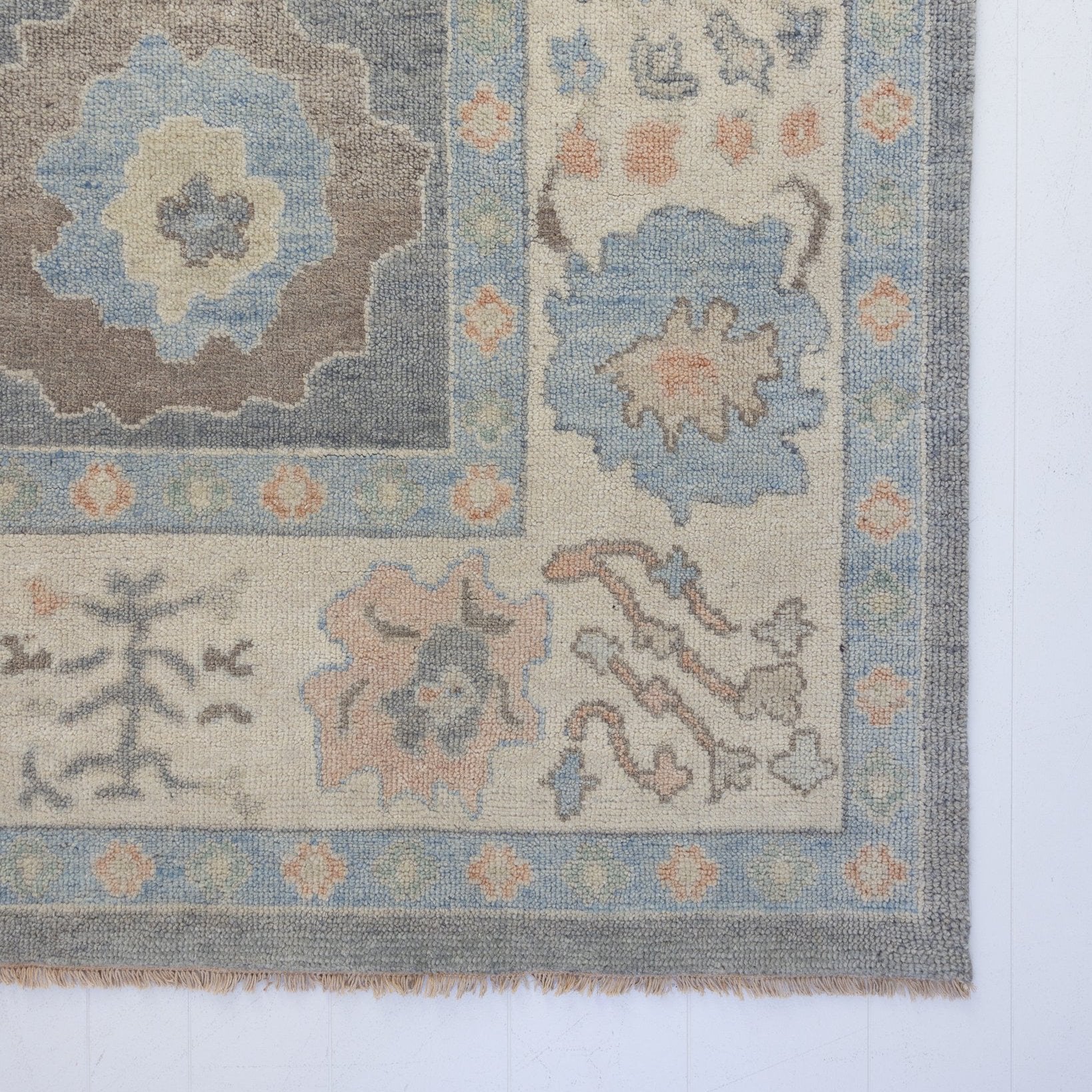 muted with earthy tones hand knotted rug