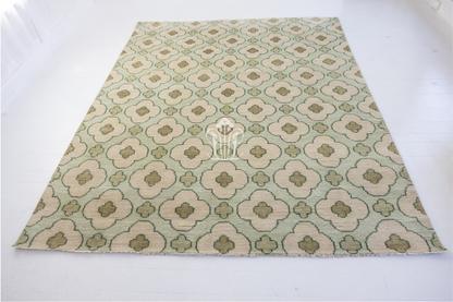 Patterned rug with floral design on a white background