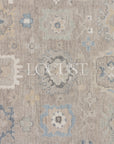 soft tones of beige, blue and grey hand knotted rug