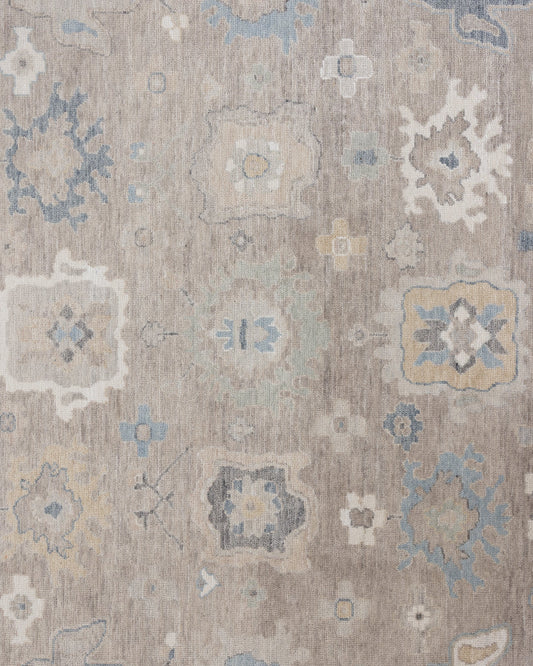 Etta hand-knotted wool Modern Oushak rug in soft neutral and muted blue tones