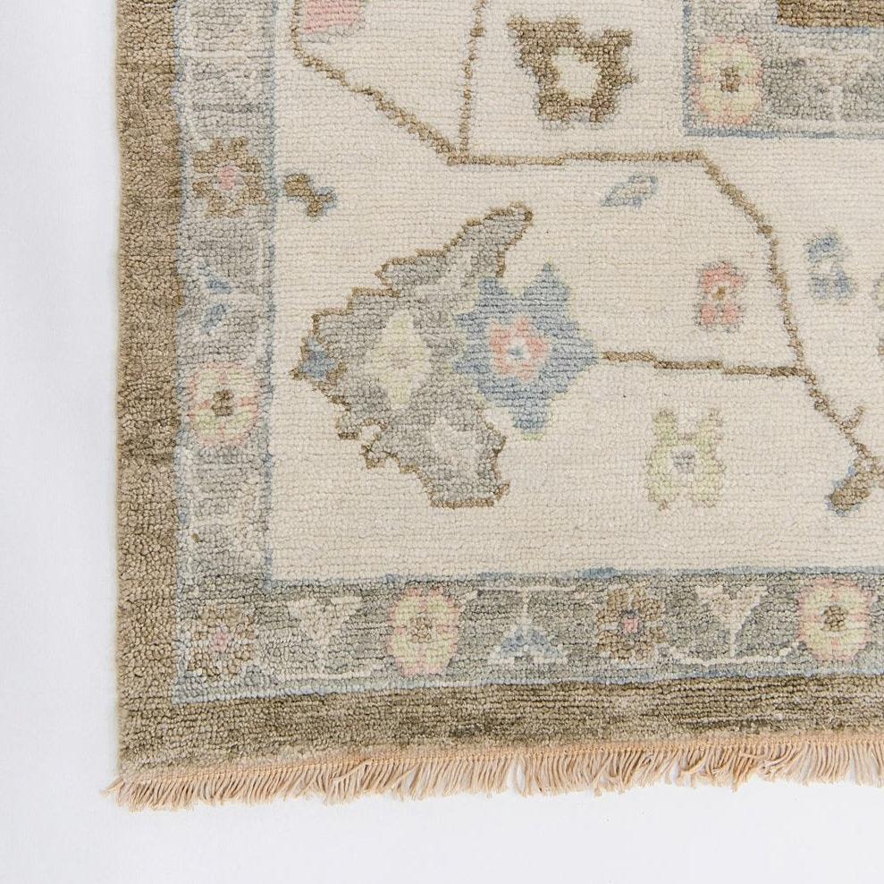 Pecan brown, cream and muted tones hand knotted rug
