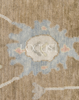 Pecan brown, cream and muted tones hand knotted rug