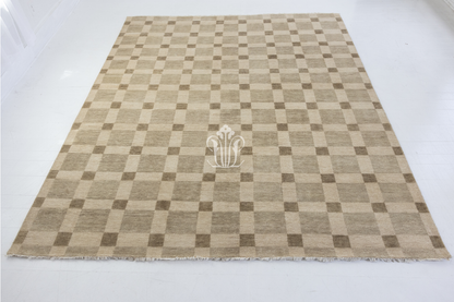 Checkered rug with a central logo on a white background