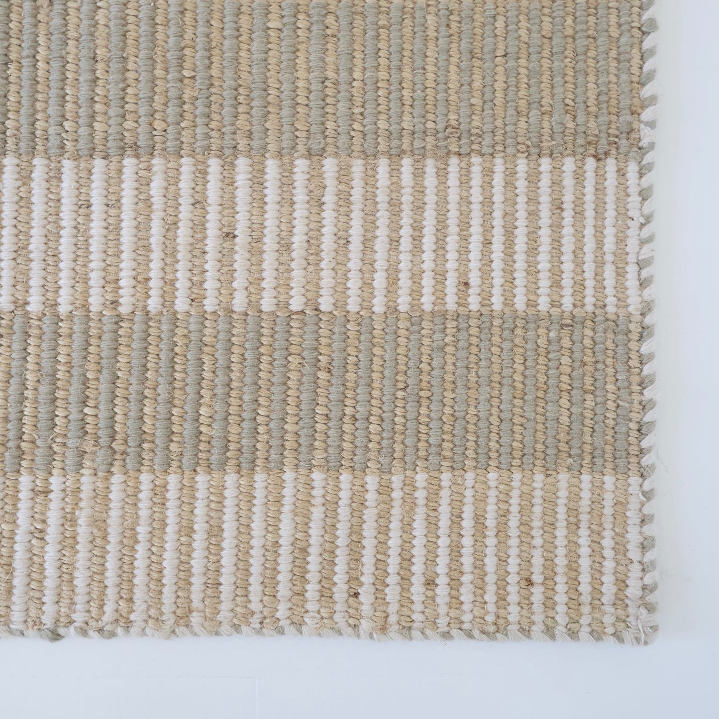 Neutral taupe and ivory striped handwoven rug made from a durable jute and wool blend — Broken Stripe Neutral Rug by Locust Lane Rugs