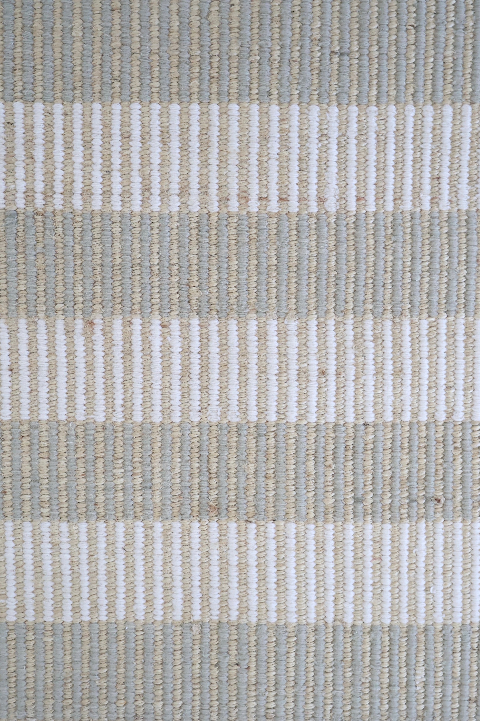 Neutral taupe and ivory striped handwoven rug made from a durable jute and wool blend — Broken Stripe Neutral Rug by Locust Lane Rugs