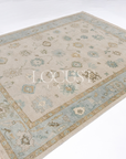 neutral and blue handknotted rug