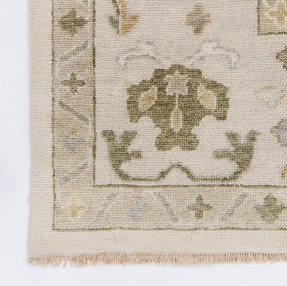 neutral with warm tones hand knotted rug 