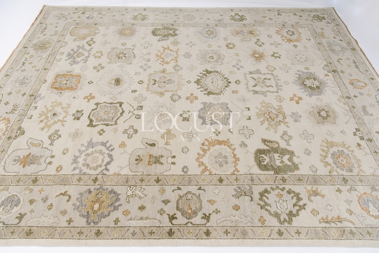 neutral with warm tones hand knotted rug 