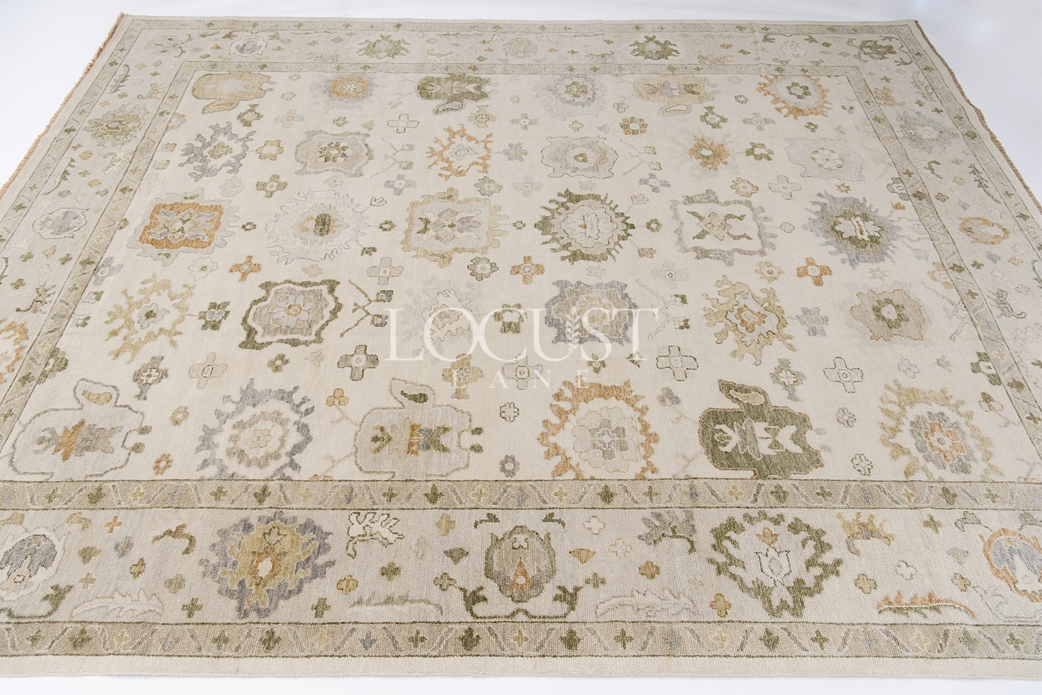 neutral with warm tones hand knotted rug 