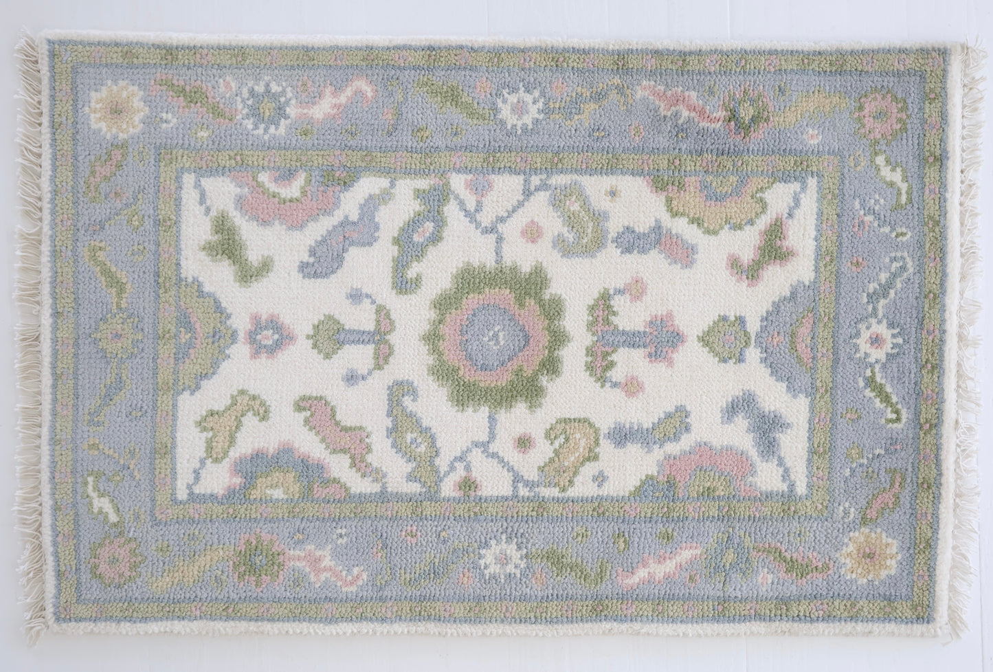 Decorative  Riley rug with intricate patterns on a white background