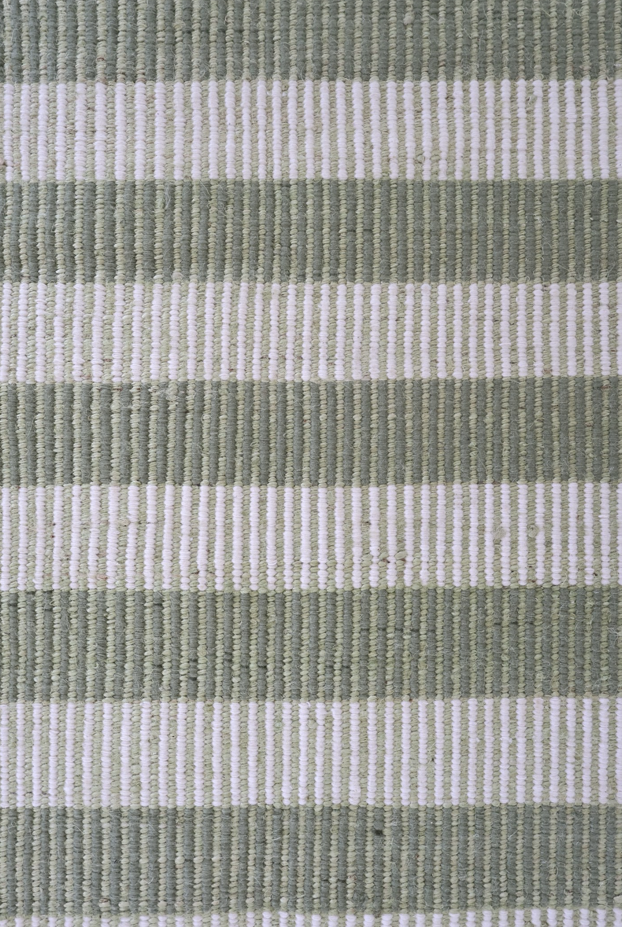 Green and ivory striped handwoven rug made from a durable jute and wool blend — Broken Stripe Green Rug by Locust Lane Rugs