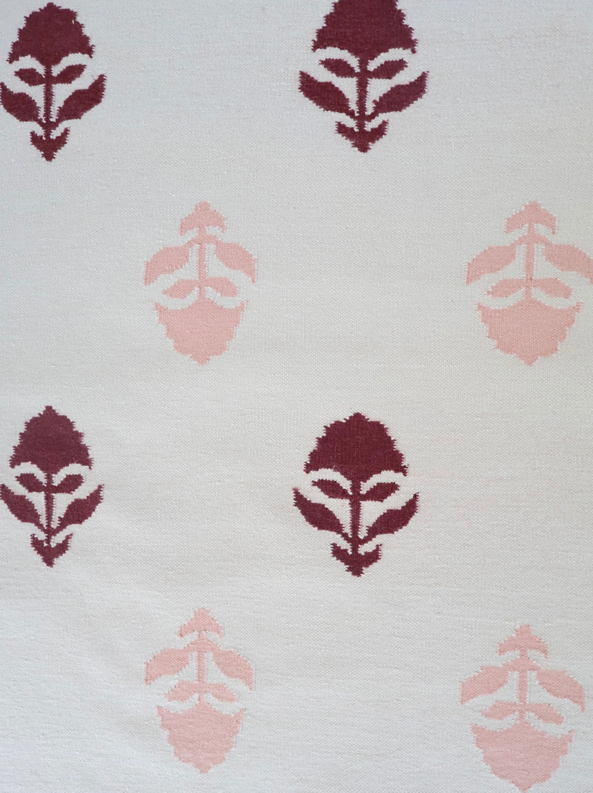 Flatweave rug with maroon and pink floral motifs and coordinating border, reversible construction — Cottage Floral Rug by Locust Lane Rugs