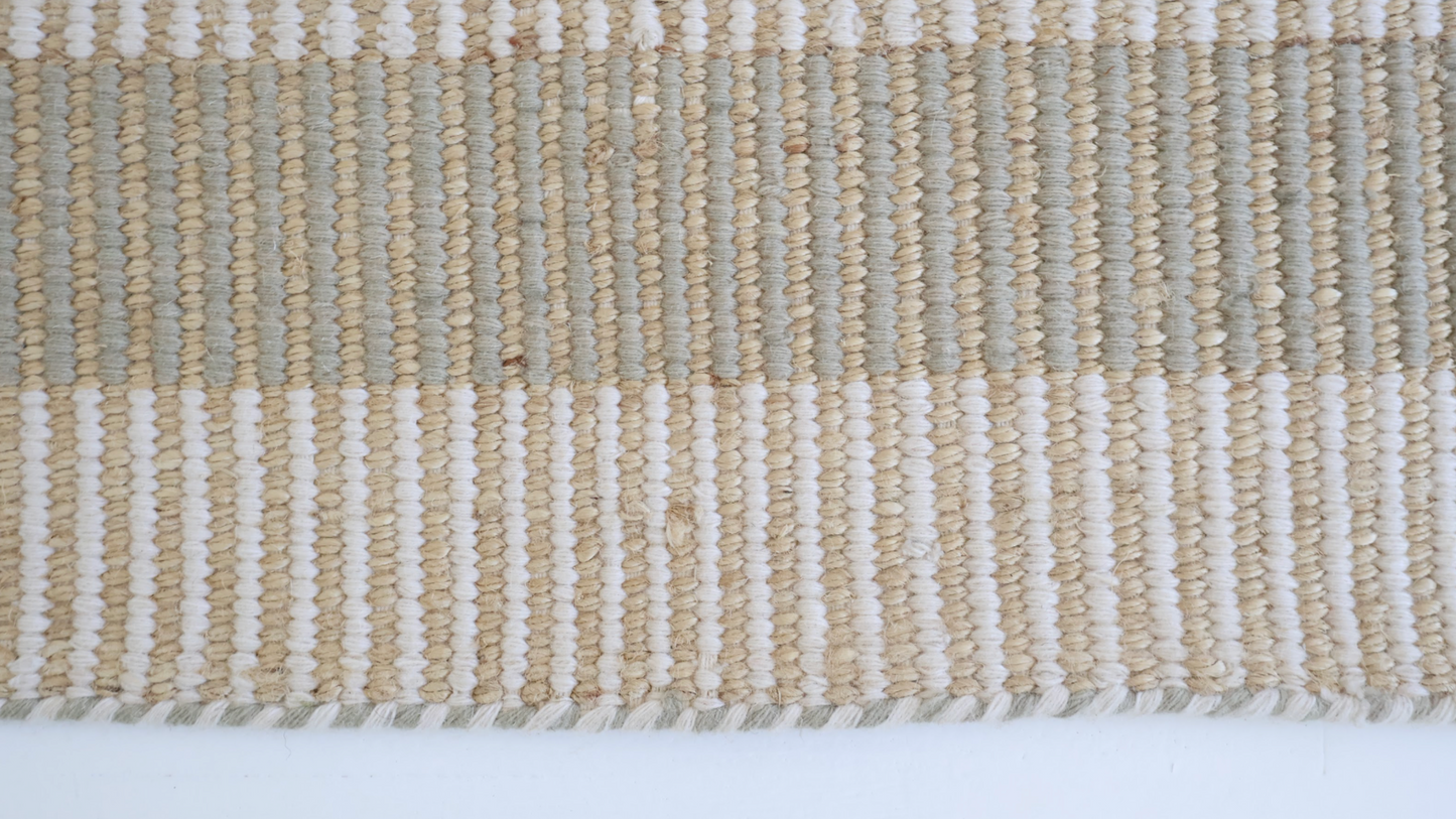 Neutral taupe and ivory striped handwoven rug made from a durable jute and wool blend — Broken Stripe Neutral Rug by Locust Lane Rugs