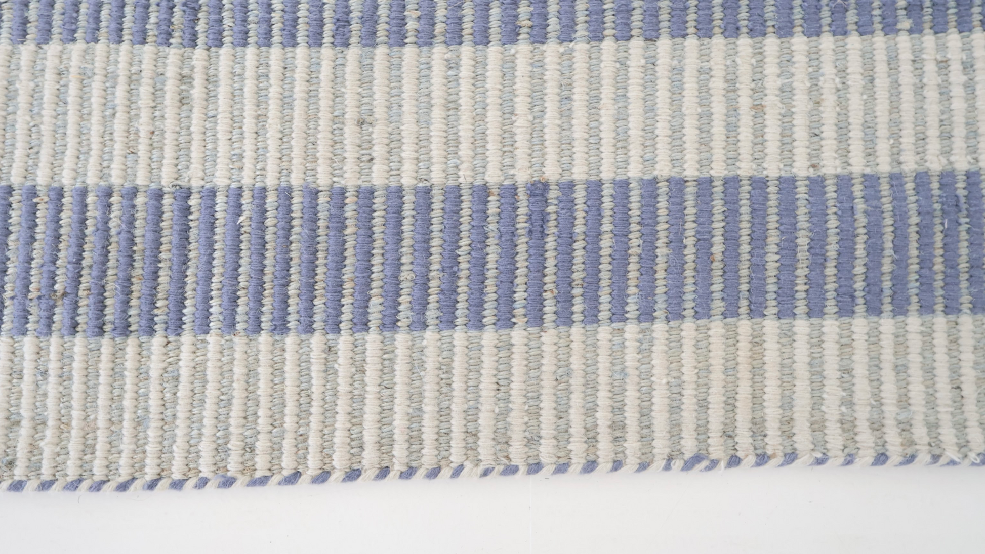 Handwoven blue and ivory striped rug made from natural jute and wool – Broken Stripe Blue Jute and Wool Rug by Locust Lane Rugs