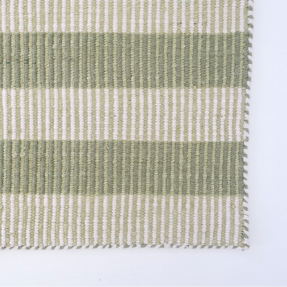 Green and ivory striped handwoven rug made from a durable jute and wool blend — Broken Stripe Green Rug by Locust Lane Rugs