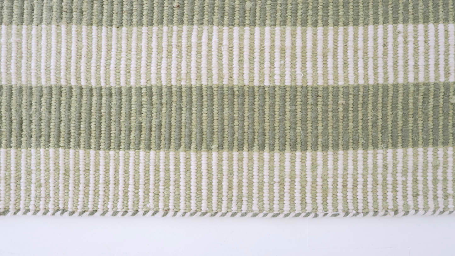 Green and ivory striped handwoven rug made from a durable jute and wool blend — Broken Stripe Green Rug by Locust Lane Rugs