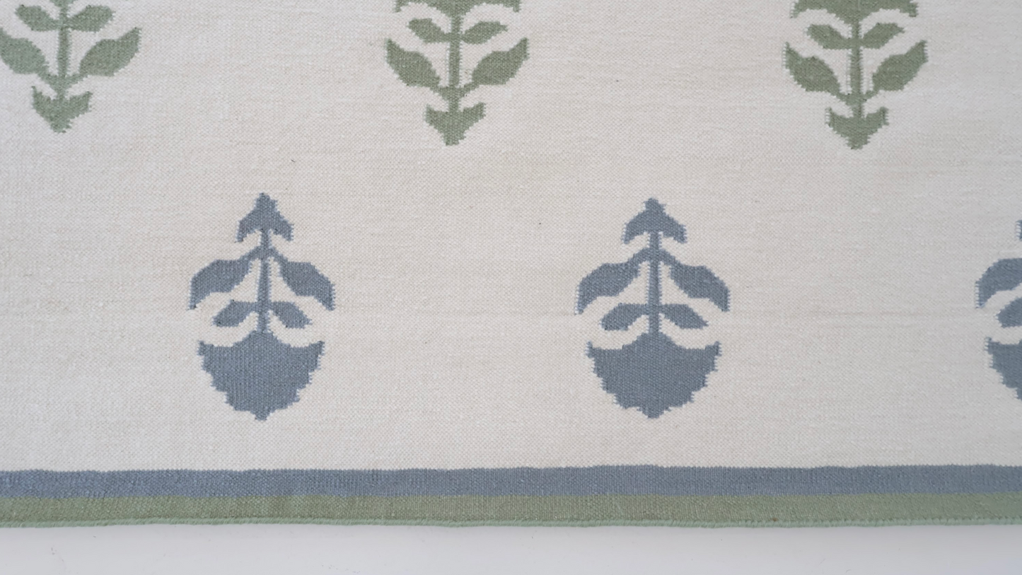 Flatweave rug with blue and green floral motifs and coordinating border, reversible construction — Cottage Floral Blue & Green Rug by Locust Lane Rugs