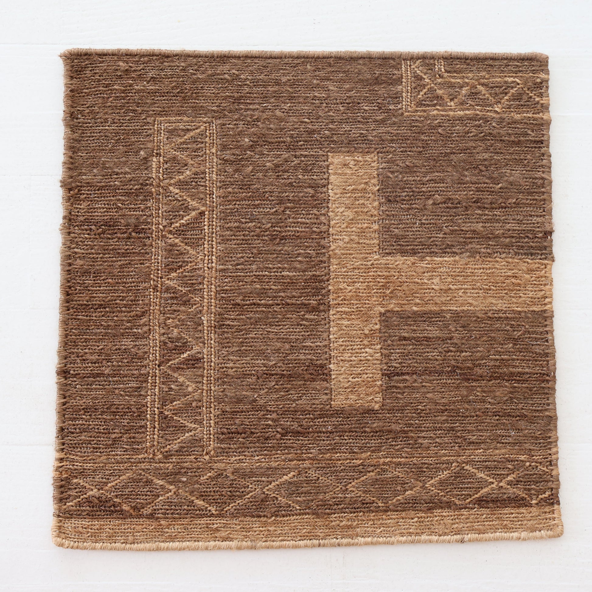 Handspun jute rug sample in warm brown tones with geometric woven detailing – Sienna Rug Sample by Locust Lane Rugs