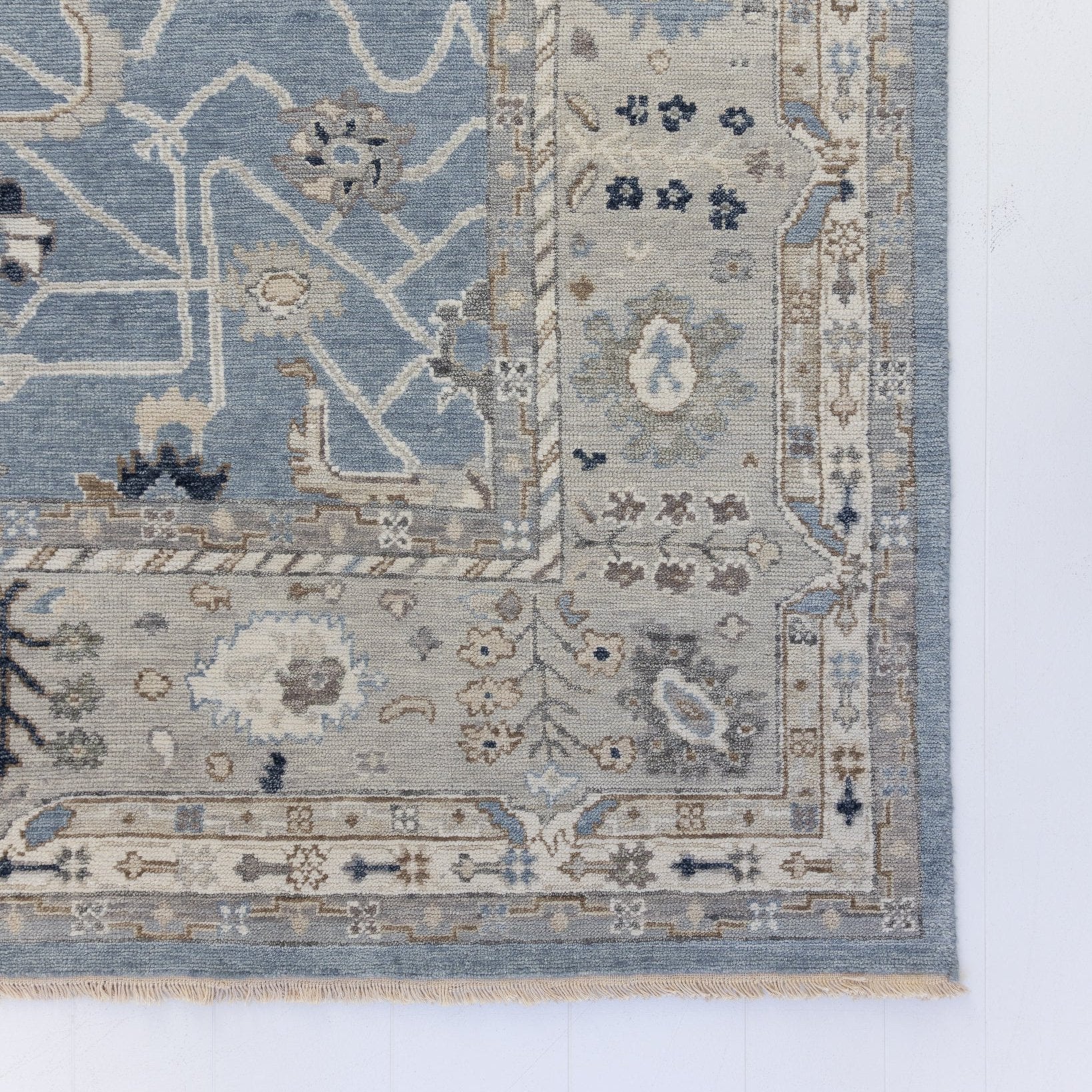 soft blue and neutral tone hand knotted rug