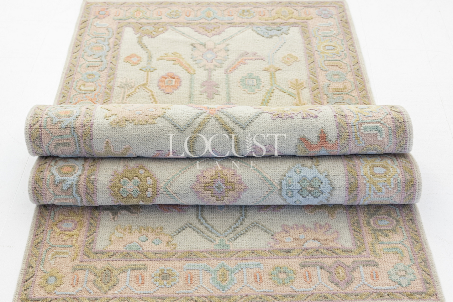      Hand-knotted wool rug in soft pastel tones with raised floral detailing – Belle Embossed Rug by Locust Lane Rugs