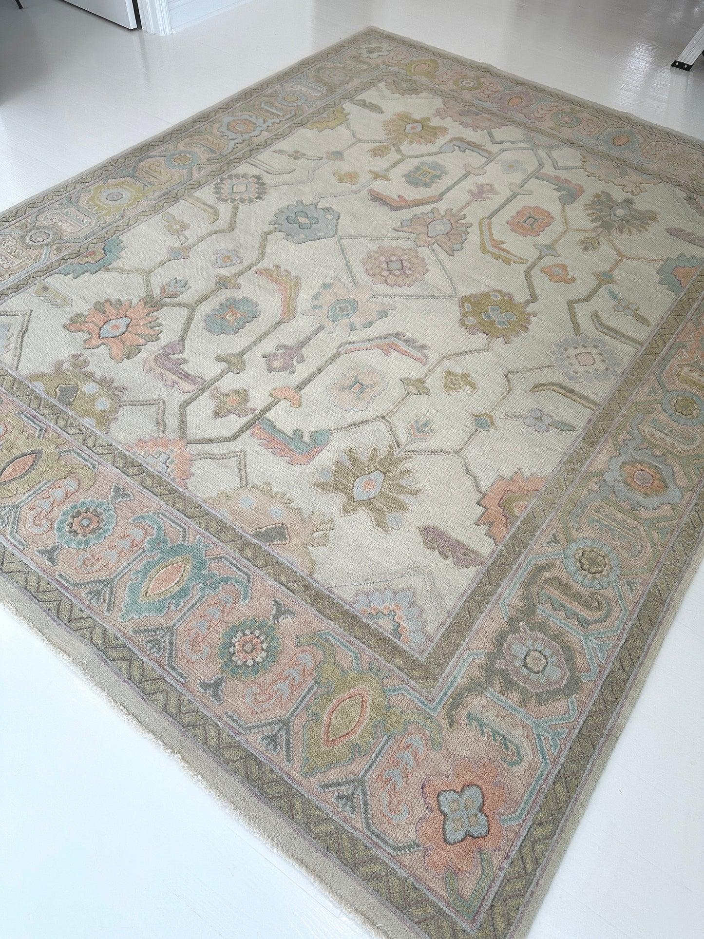 Hand-knotted wool rug in soft pastel tones with raised floral detailing – Belle Embossed Rug by Locust Lane Rugs