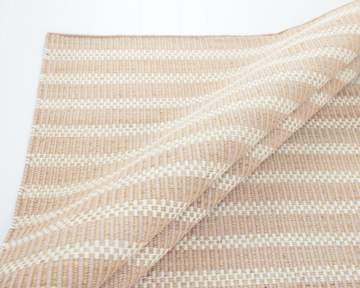 Handwoven jute and wool rug with blush pink, ivory, and natural stripes – Blush Jute & Wool Rug by Locust Lane Rugs