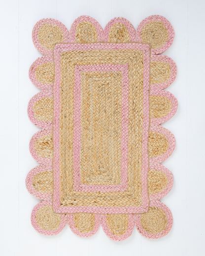 Handwoven 100% jute rug with natural field, bright pink scalloped edge, and protective cotton backing – Bright Pink Scalloped Edge Jute Rug by Locust Lane Rugs