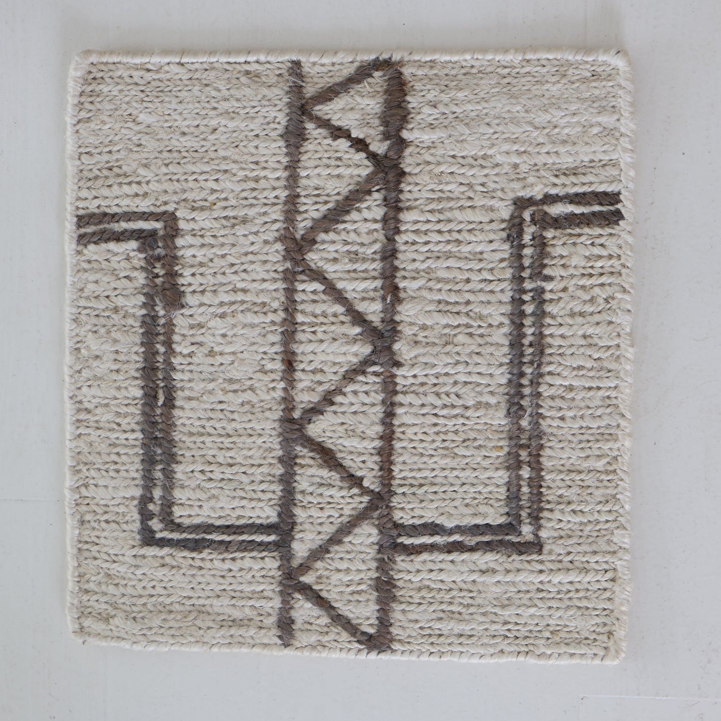 Handwoven jute and wool rug sample in natural ivory with espresso geometric pattern – Cleo Rug Sample by Locust Lane Rugs