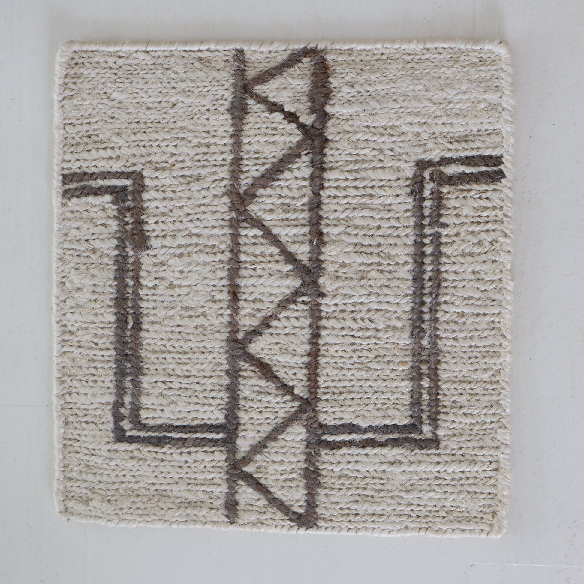 Handwoven jute and wool rug sample in natural ivory with espresso geometric pattern – Cleo Rug Sample by Locust Lane Rugs