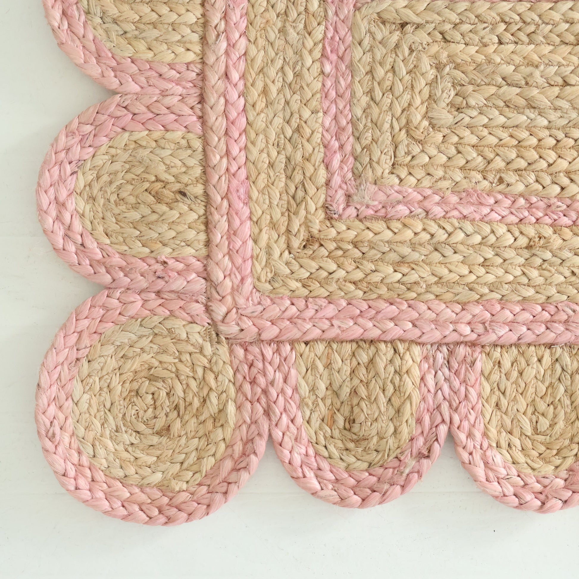 Hand-braided natural jute rug with scalloped light pink border and rectangular woven center – Light Pink Scalloped Jute Rug by Locust Lane Rugs