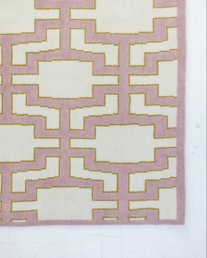 Hand-knotted wool rug with geometric Modern Oushak pattern in pink, ivory, and golden accents – Ella Modern Oushak Rug by Locust Lane Rugs