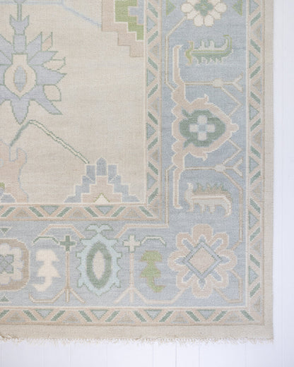 Fiona hand-knotted modern Oushak rug styled in a living room