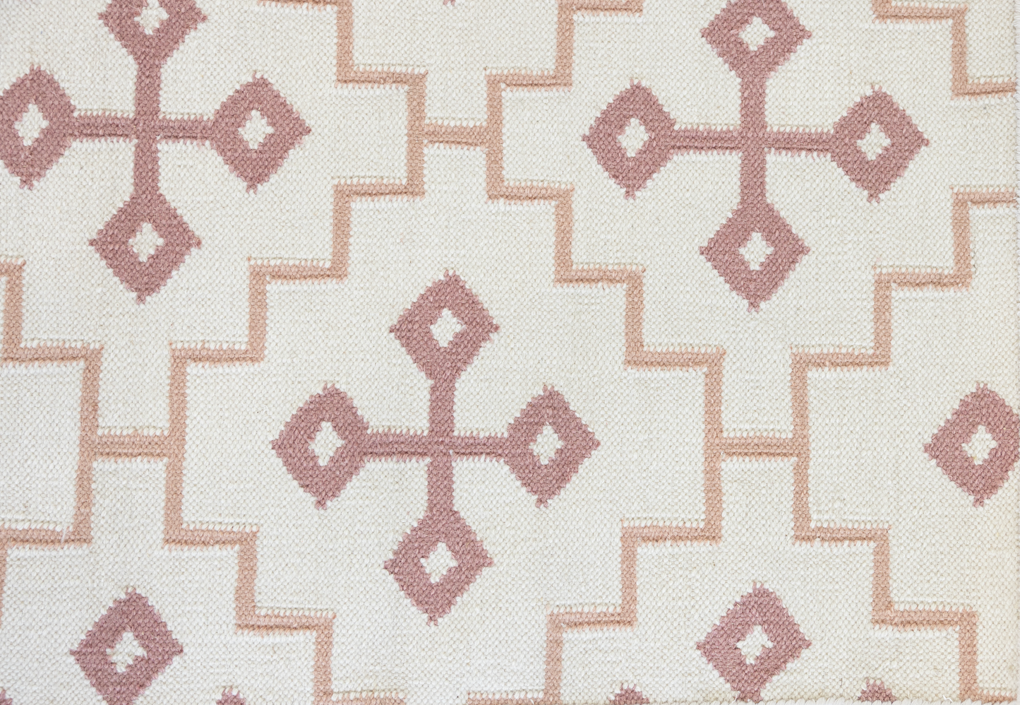 French Rose Flatweave Rug with a dusty rose geometric pattern handwoven from 100% wool on an ivory background.