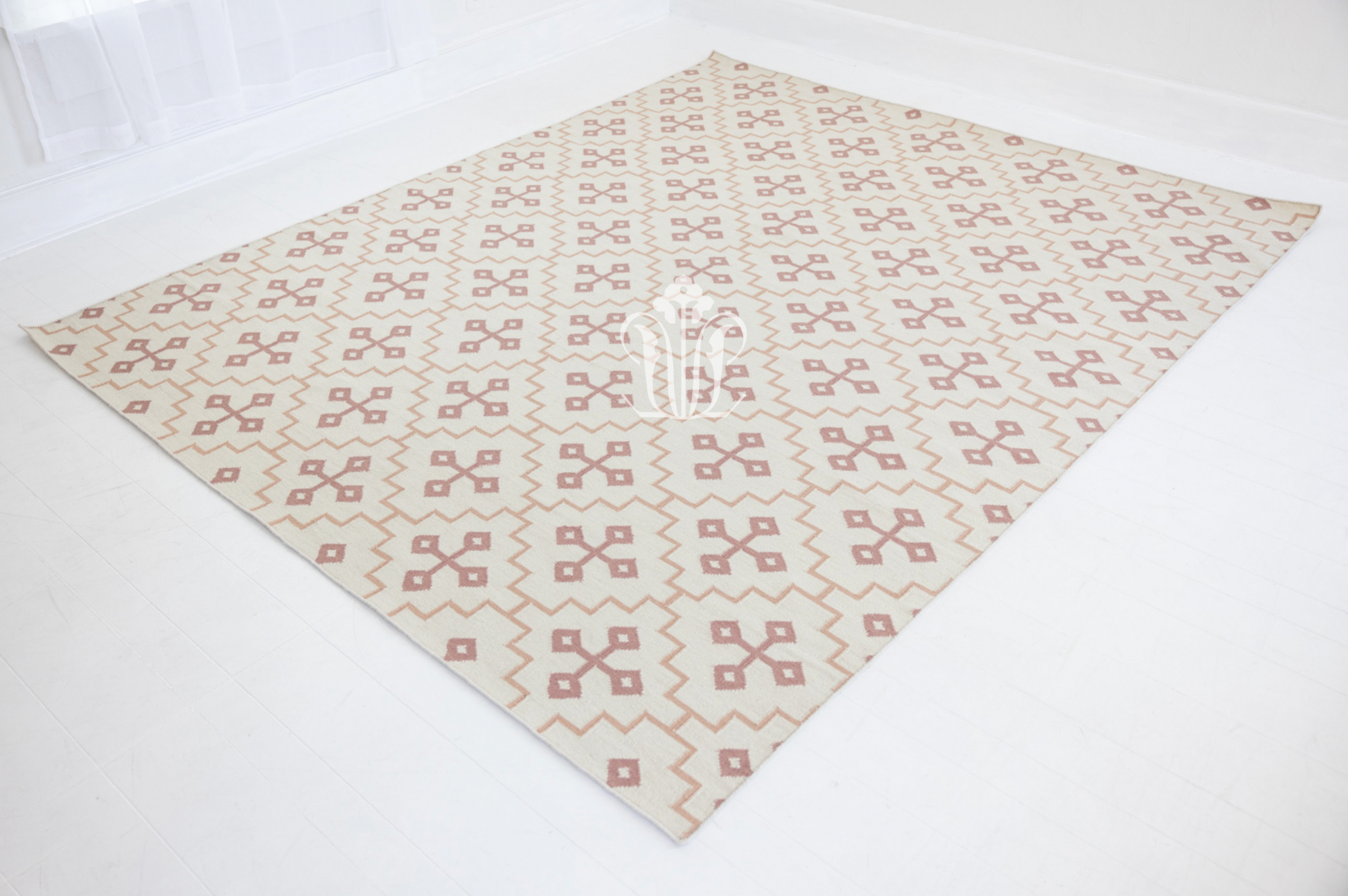 Full view of the French Rose Flatweave Rug showcasing its timeless geometric design.