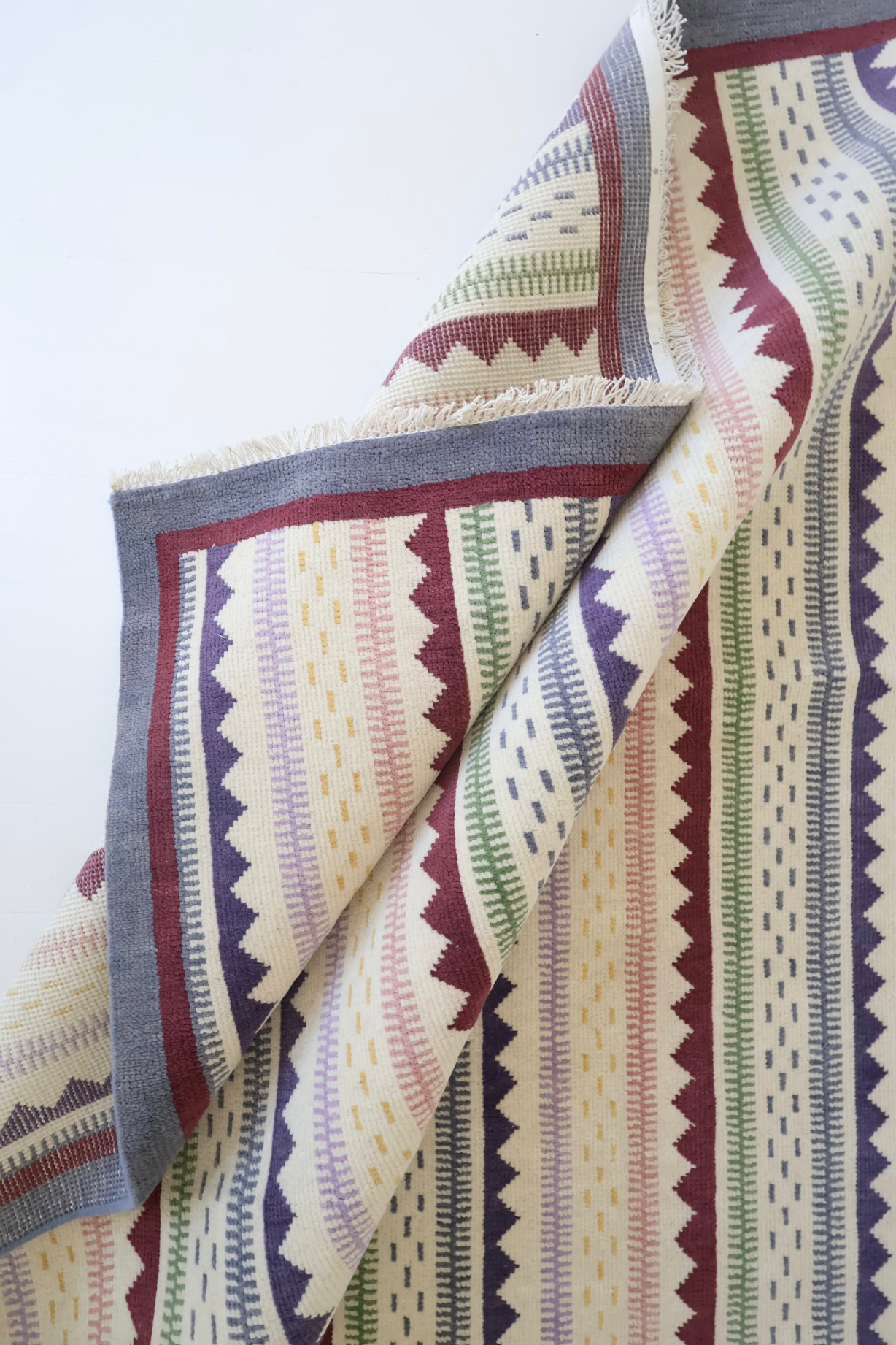 Hand-knotted 100% wool rug featuring multi-color stripes and zigzag pattern – Heritage Stripe Multi Rug by Locust Lane Rugs