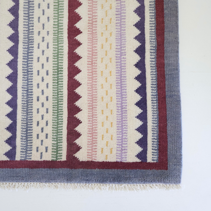 Hand-knotted 100% wool rug featuring multi-color stripes and zigzag pattern – Heritage Stripe Multi Rug by Locust Lane Rugs