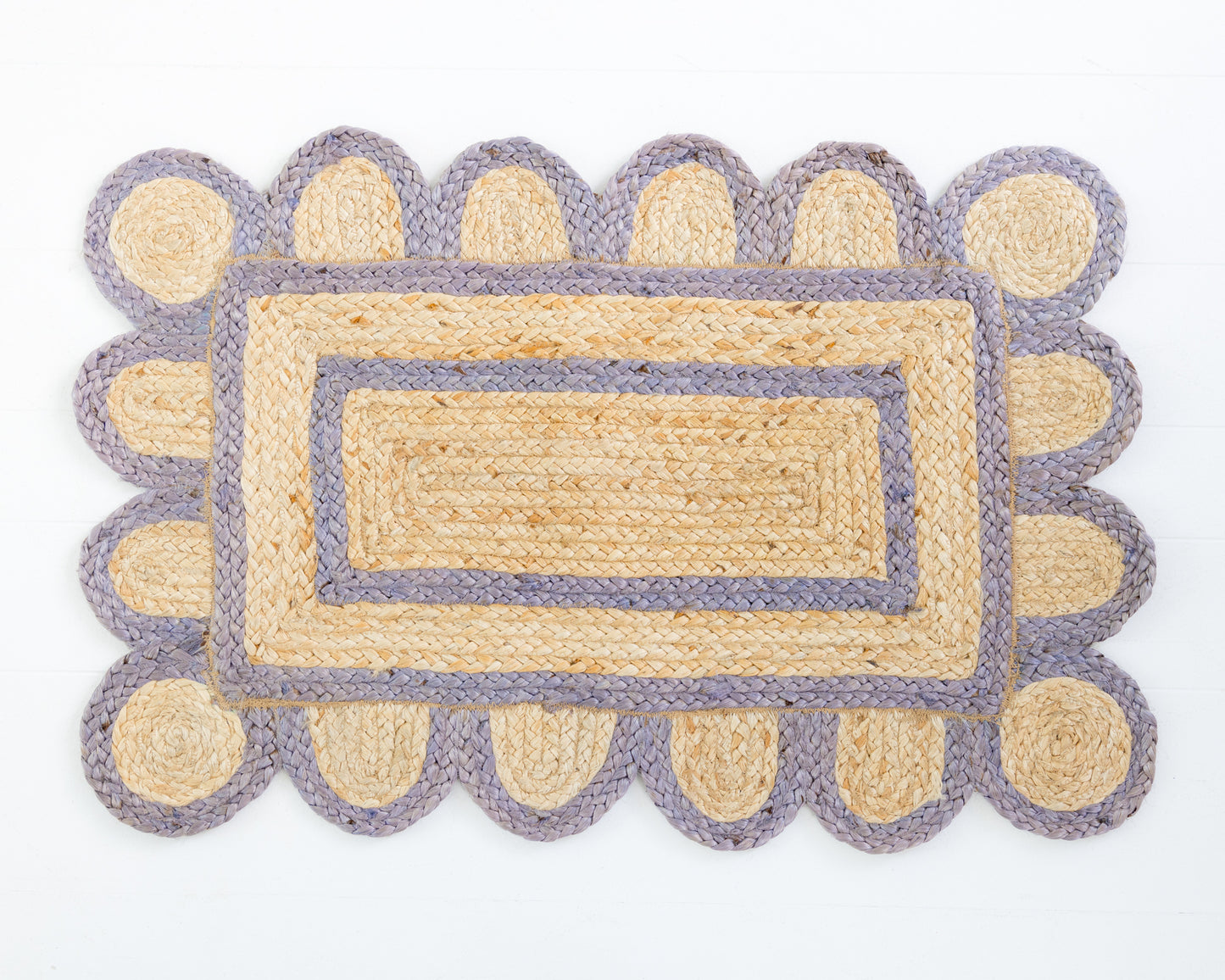 Handwoven 100% jute rug with natural field, lilac scalloped edge, and protective cotton backing – Lilac Scalloped Edge Jute Rug by Locust Lane Rugs