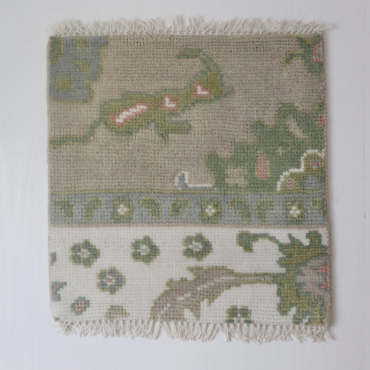 Hand-knotted Oushak rug sample in sage, ivory, and blush wool – Mary Ellis Rug Sample by Locust Lane Rugs