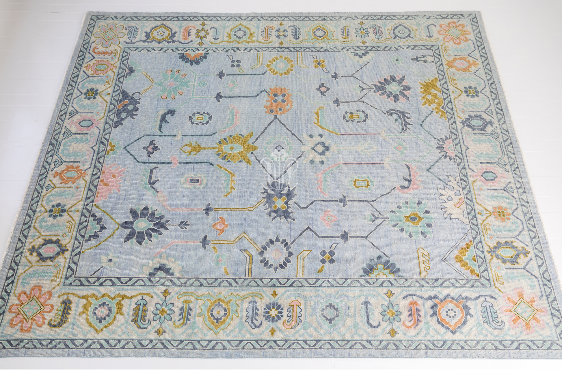 Full view of the Odette hand-knotted modern Oushak wool rug