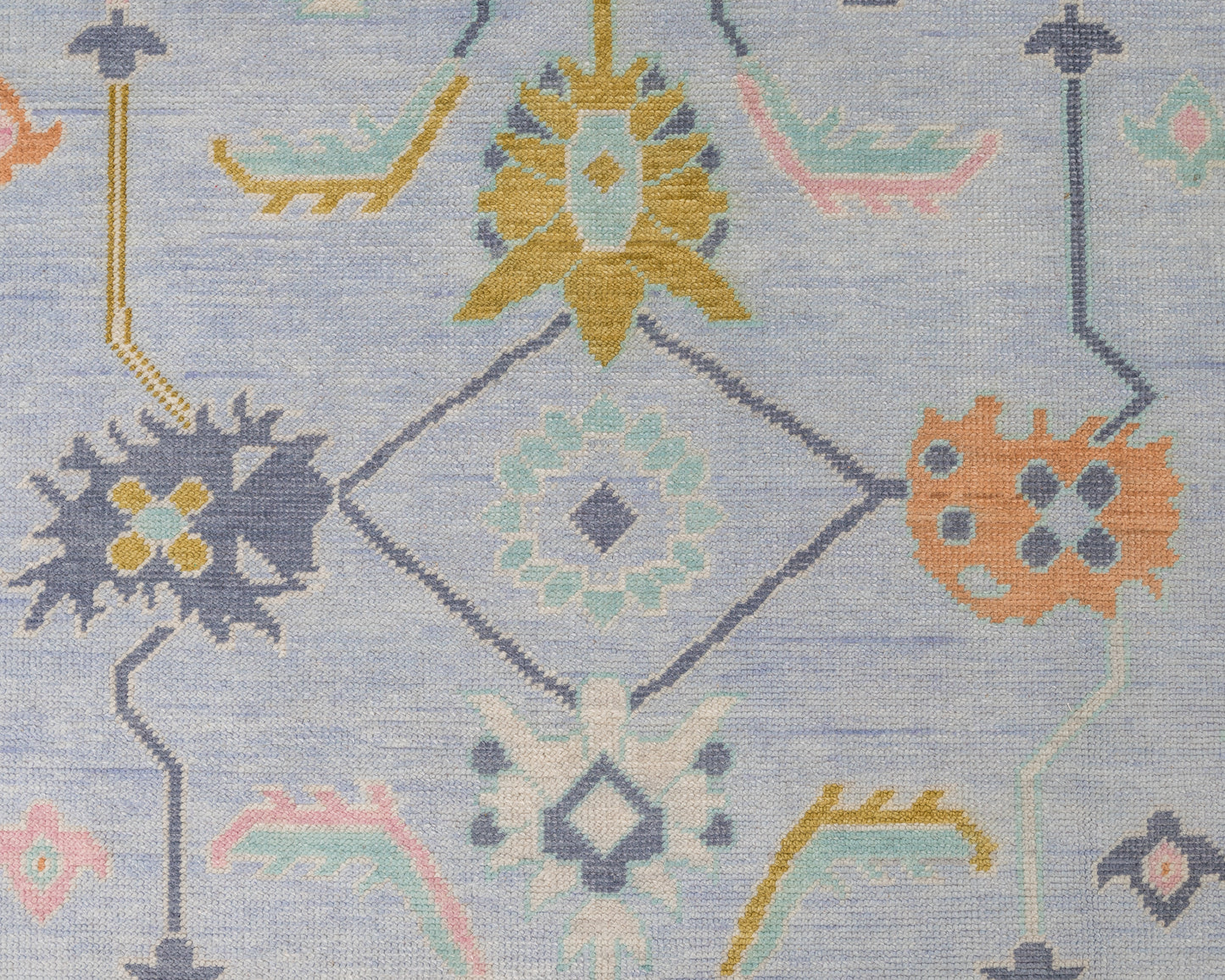Odette details of hand-knotted wool area rug