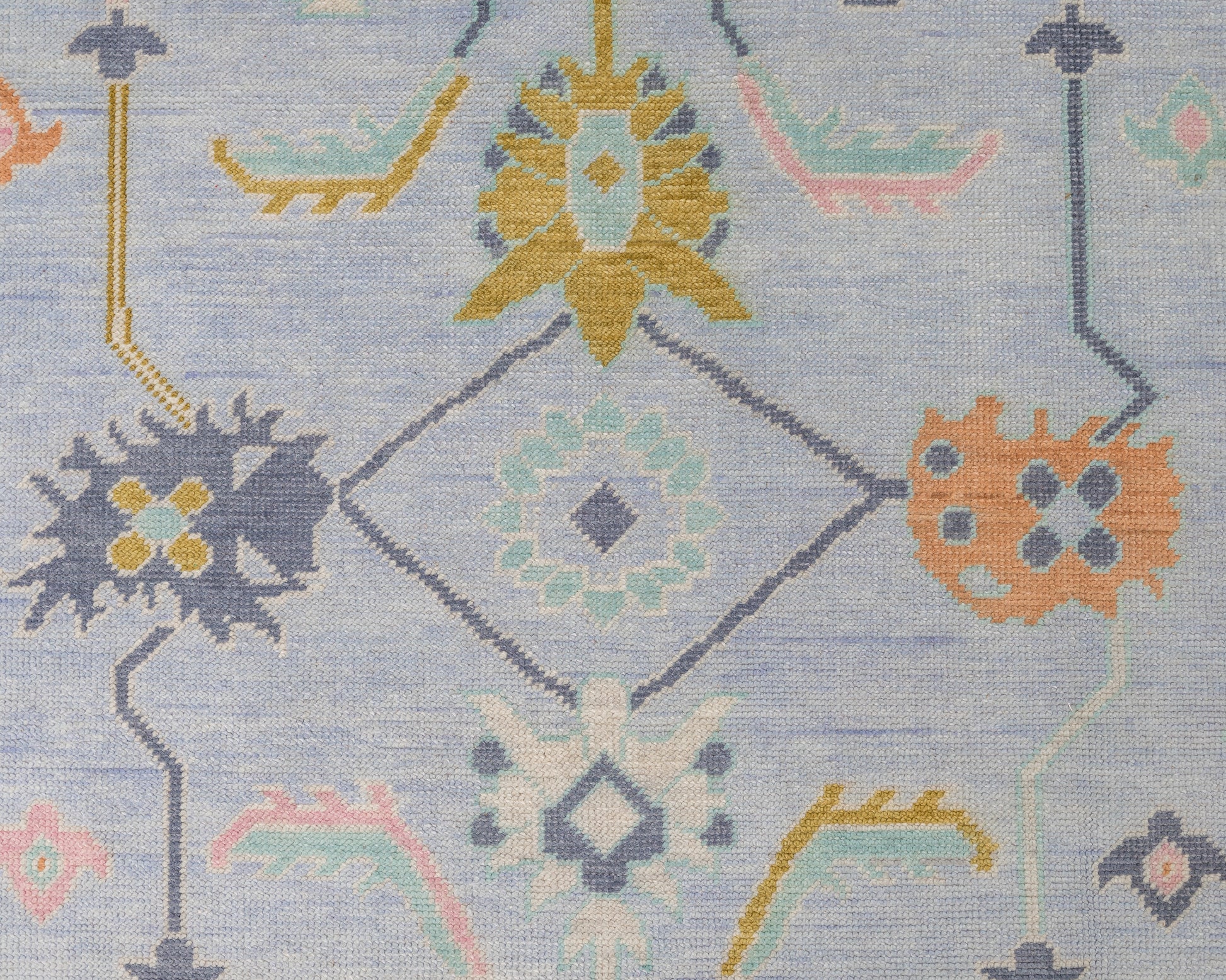 Odette details of hand-knotted wool area rug