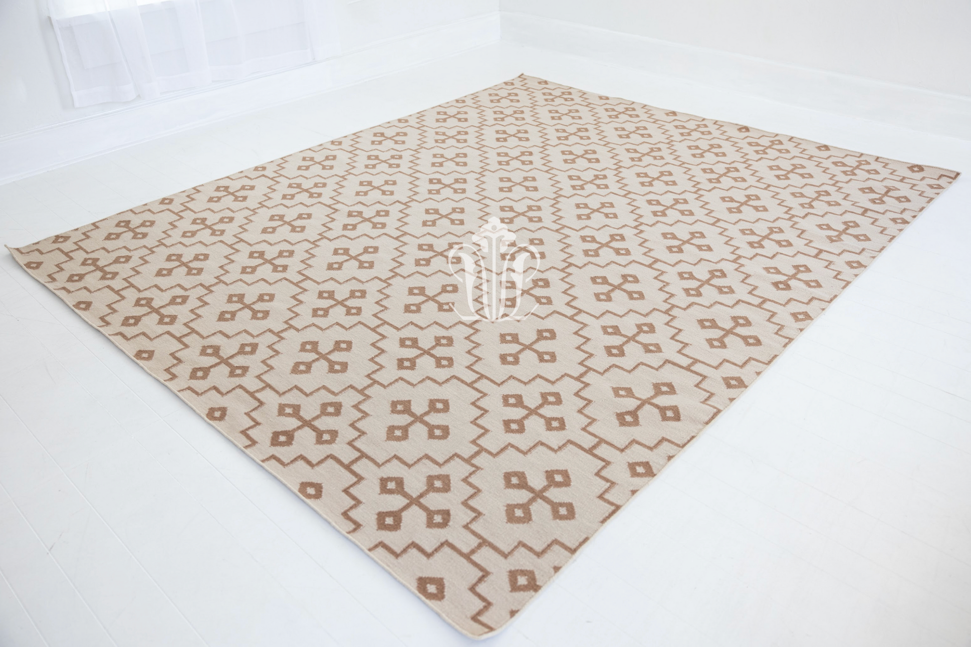 Full view of the Orchid Geometric Flatweave Rug showcasing its tonal geometric design.