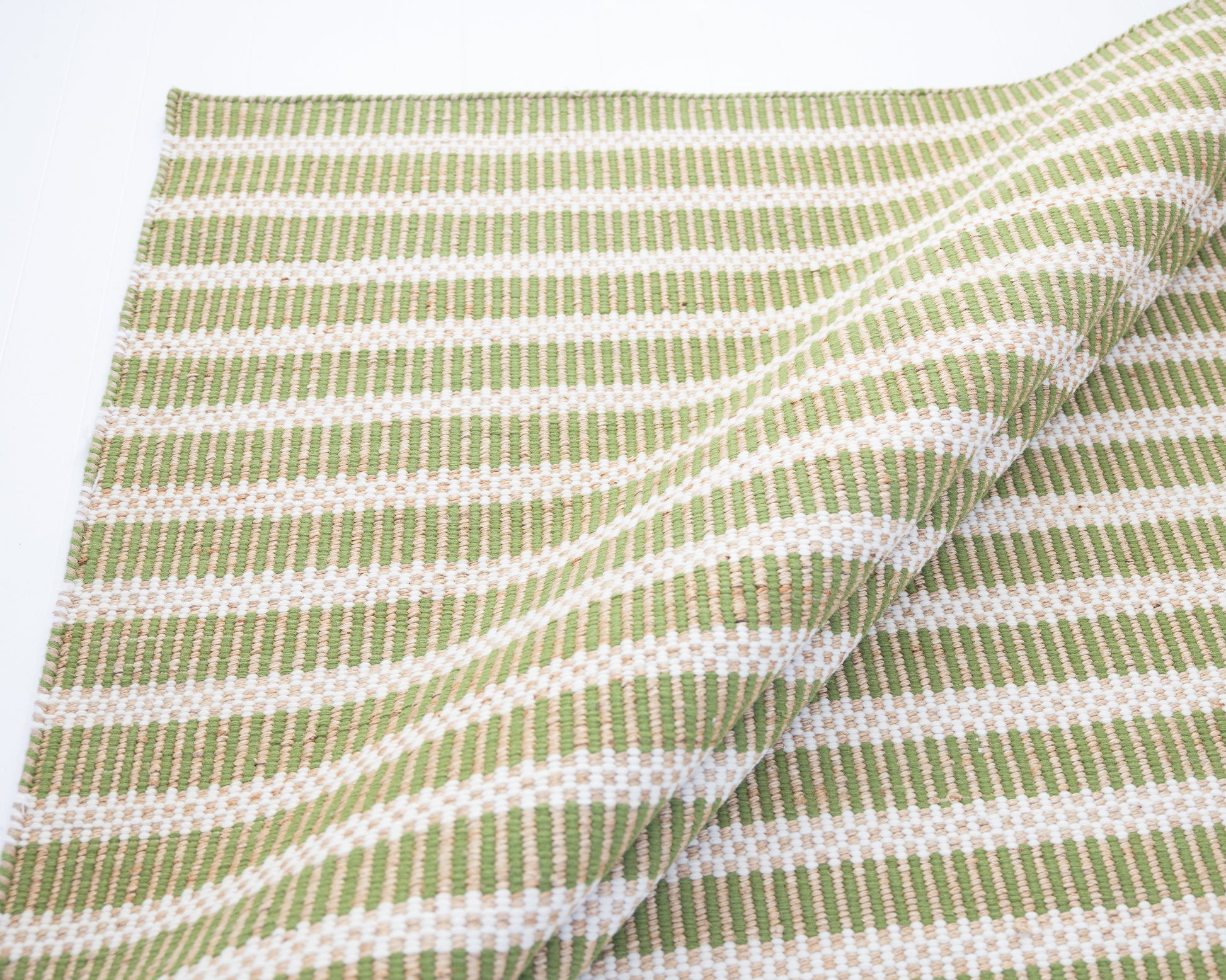 Handwoven jute and wool rug with green, ivory, and natural stripes – Pea Green Jute & Wool Rug by Locust Lane Rugs